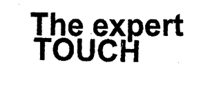 THE EXPERT TOUCH