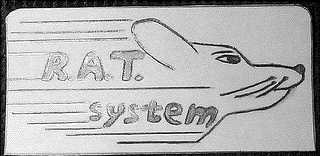 R.A.T. UNDERNEATH RAT READS SYSTEM IN LOWER CASE LETTERS, THREE SPCES FORWARD. TO THE RIGHT OF LETTERS IS A RAT HEAD WITH STREEMING LINES TRAILING FROM THE RATS EAR, AND NECK. ALSO STREEMING LINES TRAILING BEHIND THE LETTERS. 12 LINES TOTAL.REPRESENTS MOTION