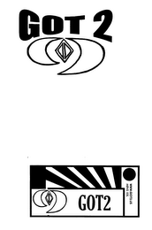 GOT 2 THE WORD GOT AND THE NUMBER 2, WITH A SYMBOL FOLLOWING THAT , THE SYMBOL IS CURVED AT BOTH ENDS WITH A DIAMOND IN THE MIDDLE