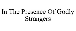 IN THE PRESENCE OF GODLY STRANGERS