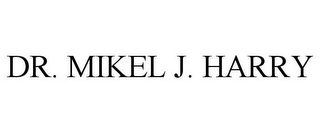 DR. MIKEL J. HARRY