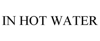 IN HOT WATER
