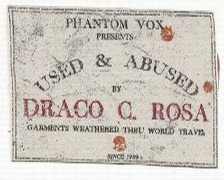 PHANTOM VOX PRESENTS USED & ABUSED BY DRACO C. ROSA GARMENTS WEATHERED THRU WORLD TRAVEL SINCE 1989