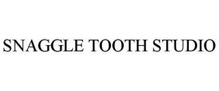 SNAGGLE TOOTH STUDIO