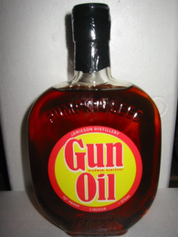 GUN OIL HICKMAN, KENTUCKY JAMIESON DISTILLERY 70% PROOF LIQUEUR ·375 ML PUMPKIN SEED FLASK