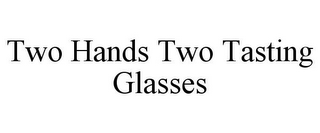 TWO HANDS TWO TASTING GLASSES