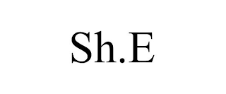 SH.E