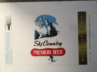 SKI COUNTRY PREMIUM BEER LIGHT AND SMOOTH 32FL. OZS. WWW.SKICONUNTRYPRENIUMBEER.COM