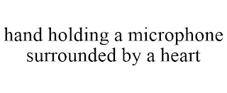 HAND HOLDING A MICROPHONE SURROUNDED BY A HEART