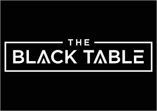THE BLACK TABLE