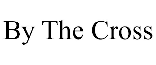BY THE CROSS