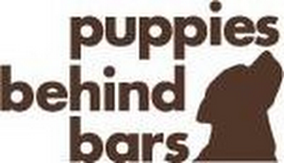 PUPPIES BEHIND BARS