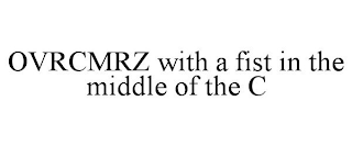 OVRCMRZ WITH A FIST IN THE MIDDLE OF THE C