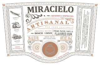 MIRACIELO RESERVA ESPECIAL ARTISANAL RUM FROM GUATEMALA ORIGINAL RECIPE SINCE 1953 PRUNE, RAISIN, VANILLA FLAVORED RUM 38% ALC. BY VOL MADE WITH MACERATIONS CONT. NET. 700 ML VANILLA PRUNE RAISINS GROWN IN GUATEMALA HAND CRAFTED HAND CRAFTED A G PRODUCT FROM GUATEMALA, CENTRAL AMERICA AN ORIGINAL RECIPE FROM CIUDAD DE SANTIAGO DE LOS CABALLEROS DE GUATEMALA, ALSO KNOWN AS ANTIGUA GUATEMALA, THAT PRESERVES TRADITIONAL FLAVORS AND SMELLS OF PLUMS AND RAISINS, COMBINED WITH THE AROMAS AND AGING OF AN AUTHENTIC RUM