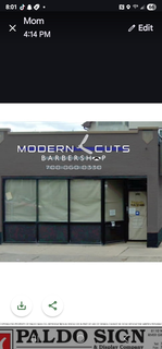 MODERN CUTS BARBERSHOP PICTURE  BLADE AND THE LETTER O WITH THE MUSTACHE