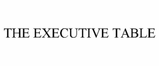 THE EXECUTIVE TABLE